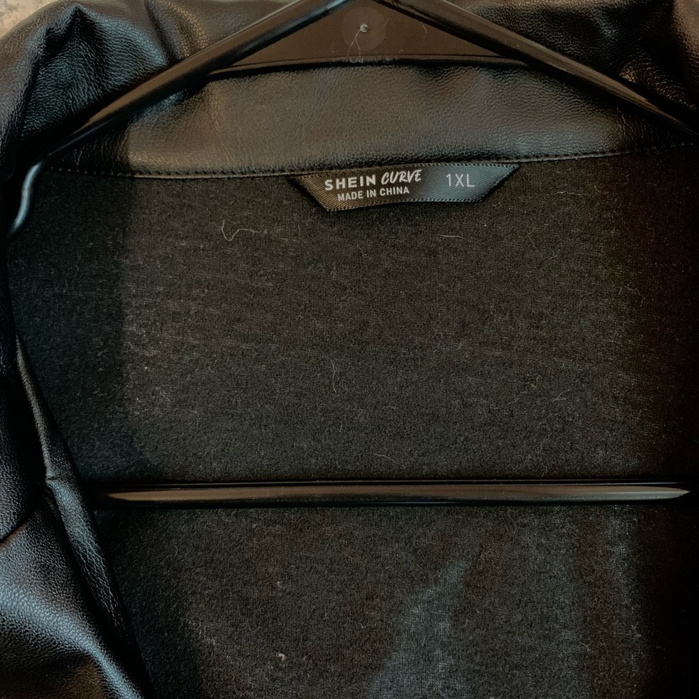 Black, thin “leather” jacket